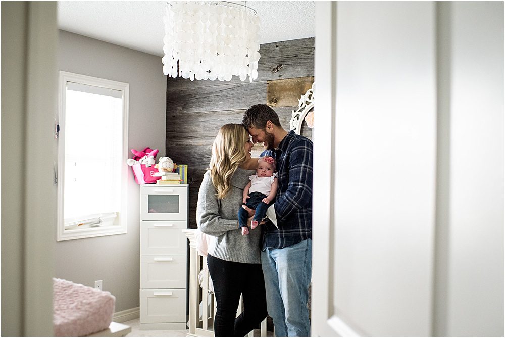 sweet family in a awesome nursery